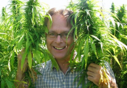 Activist Marc Emery in a legal hemp field. (Photo by Jodie Emery)